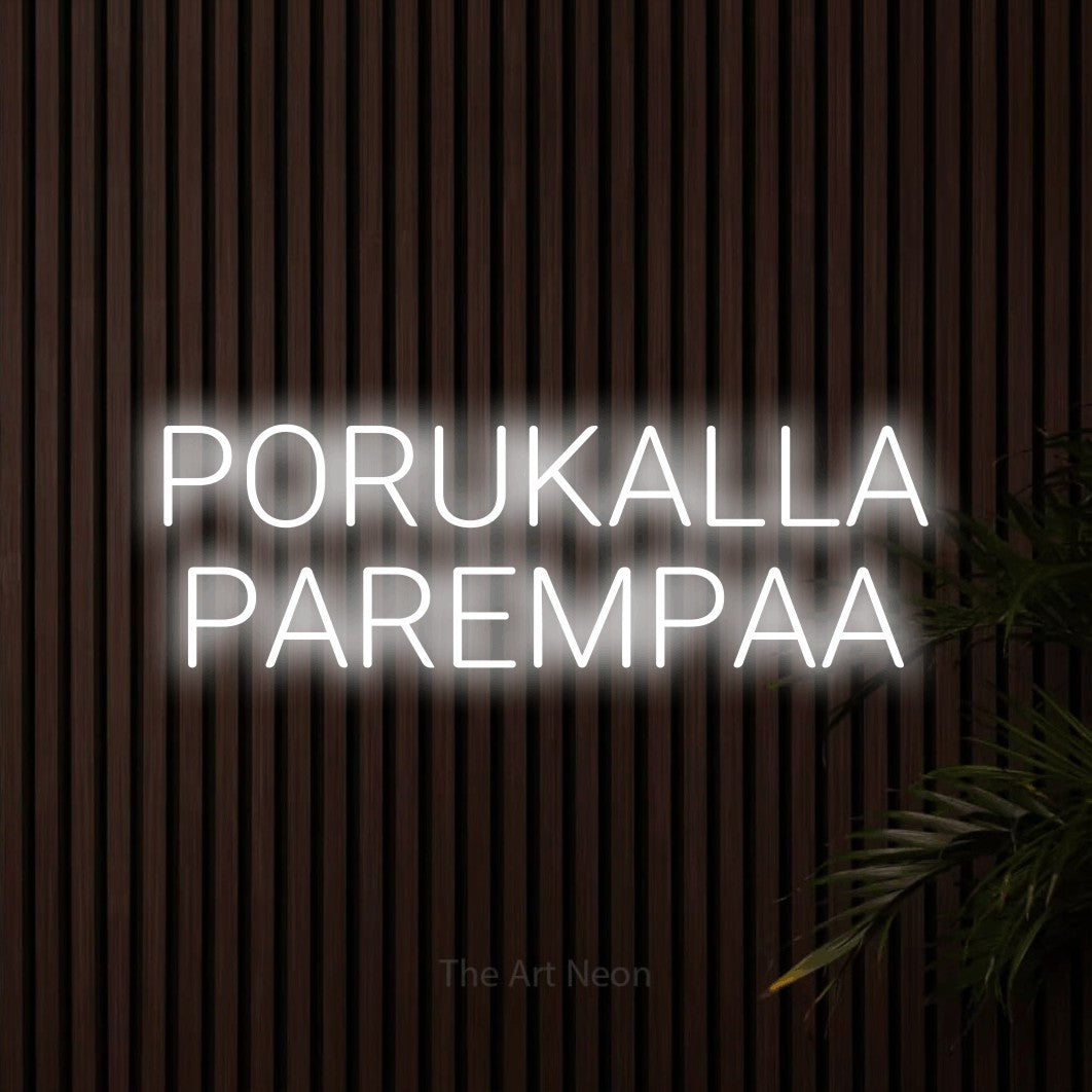 LED neon sign reading “PORUKALLA PAREMPAA”, arranged in 2 lines.