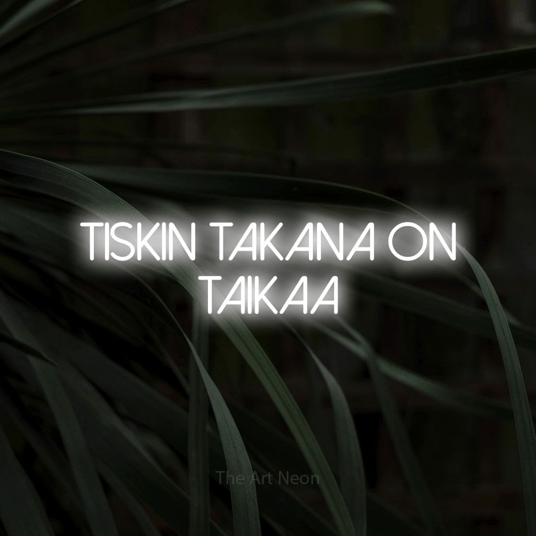 LED neon sign reading “TISKIN TAKANA ON TAIKAA”, arranged in 2 lines.