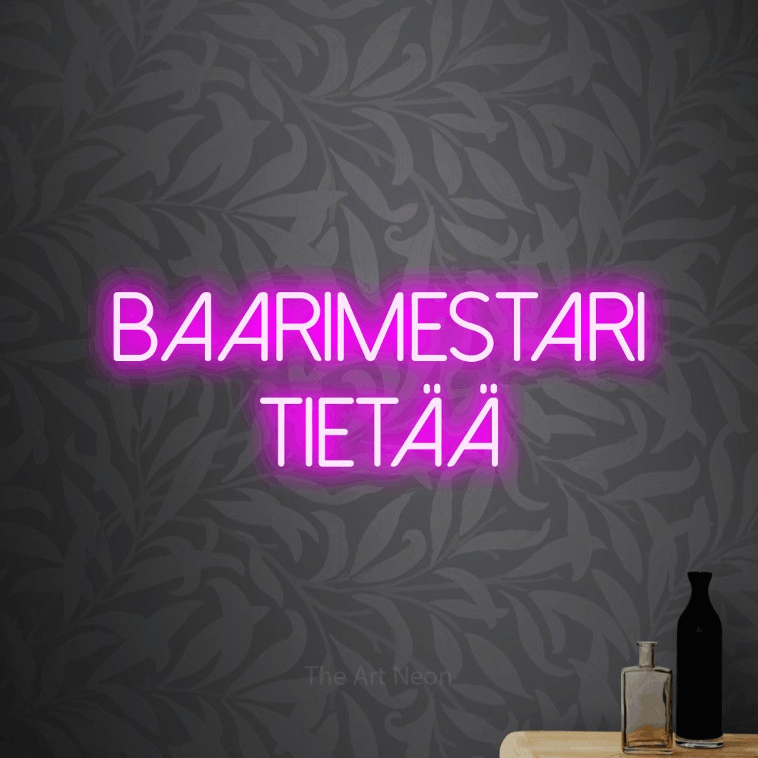 LED neon sign reading “BAARIMESTARI TIETÄÄ”, arranged in 2 lines.