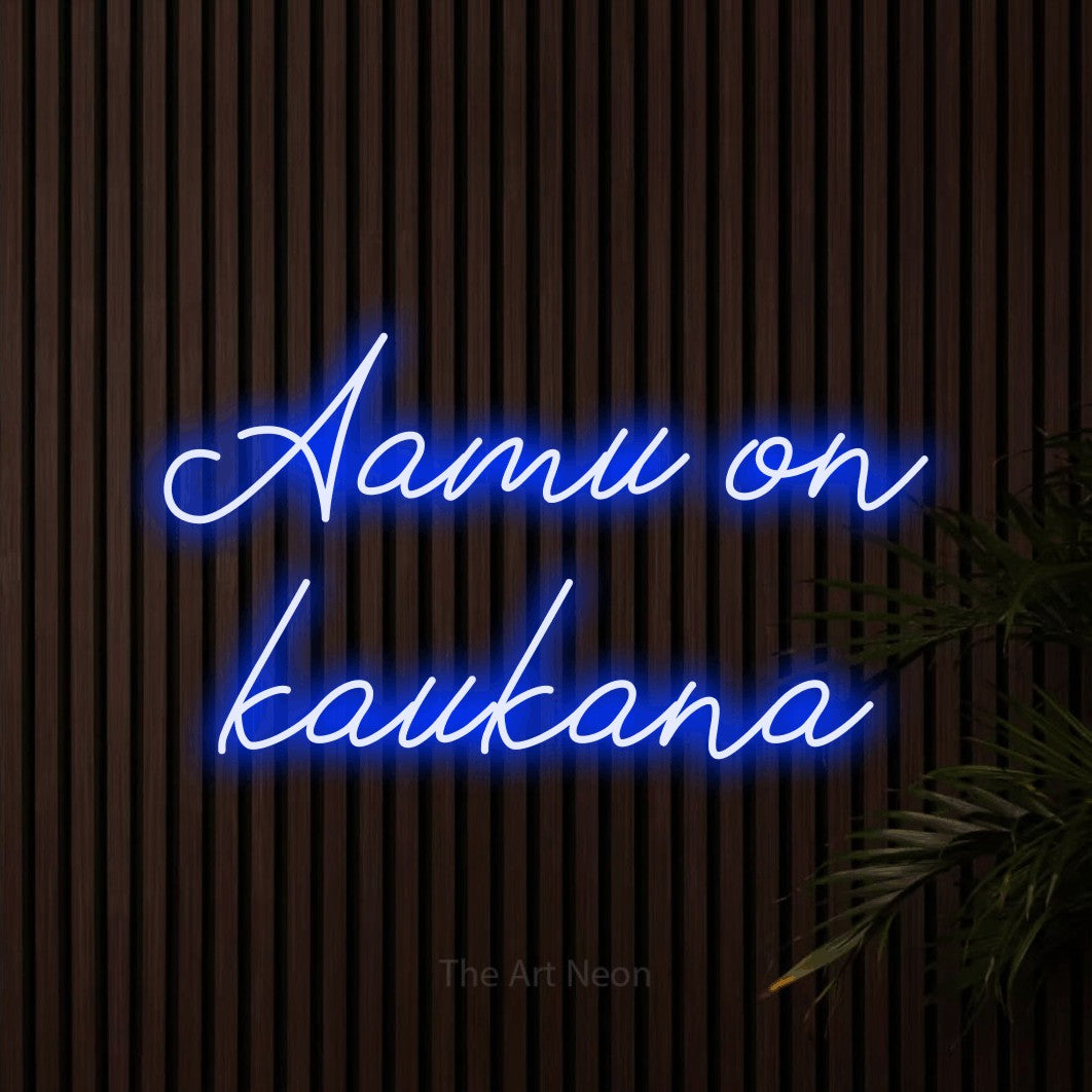 LED neon sign reading “Aamu on kaukana”, arranged in 2 lines.