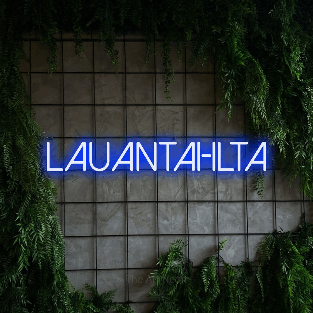 LED neon sign reading “lauantai-ilta”, arranged in a single line.