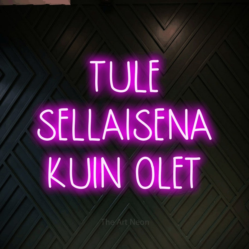 LED neon sign reading “TULE SELLAISENA KUIN OLET”, arranged in 3 lines.