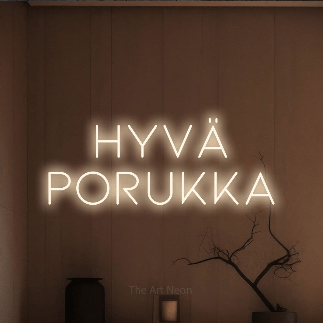 LED neon sign reading “Hyvä porukka”, arranged in 2 lines.