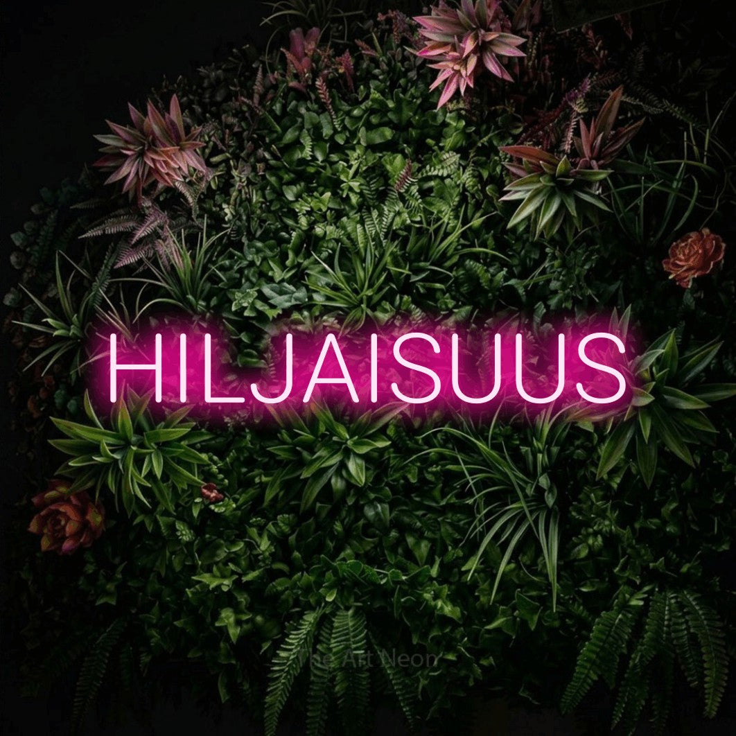 LED neon sign reading “HILJAISUUS”, arranged in a single line.