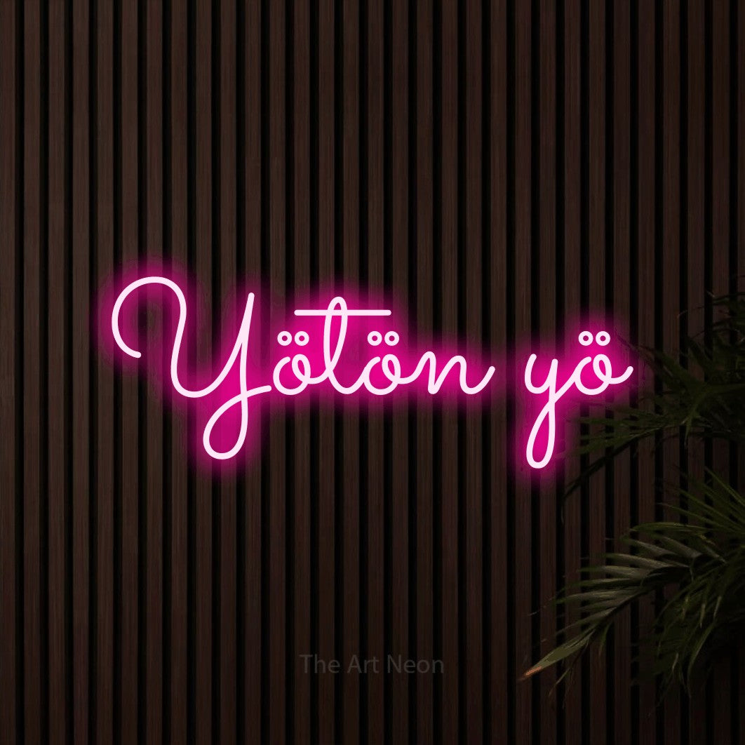 LED neon sign reading “Yötön yö”, arranged in a single line.