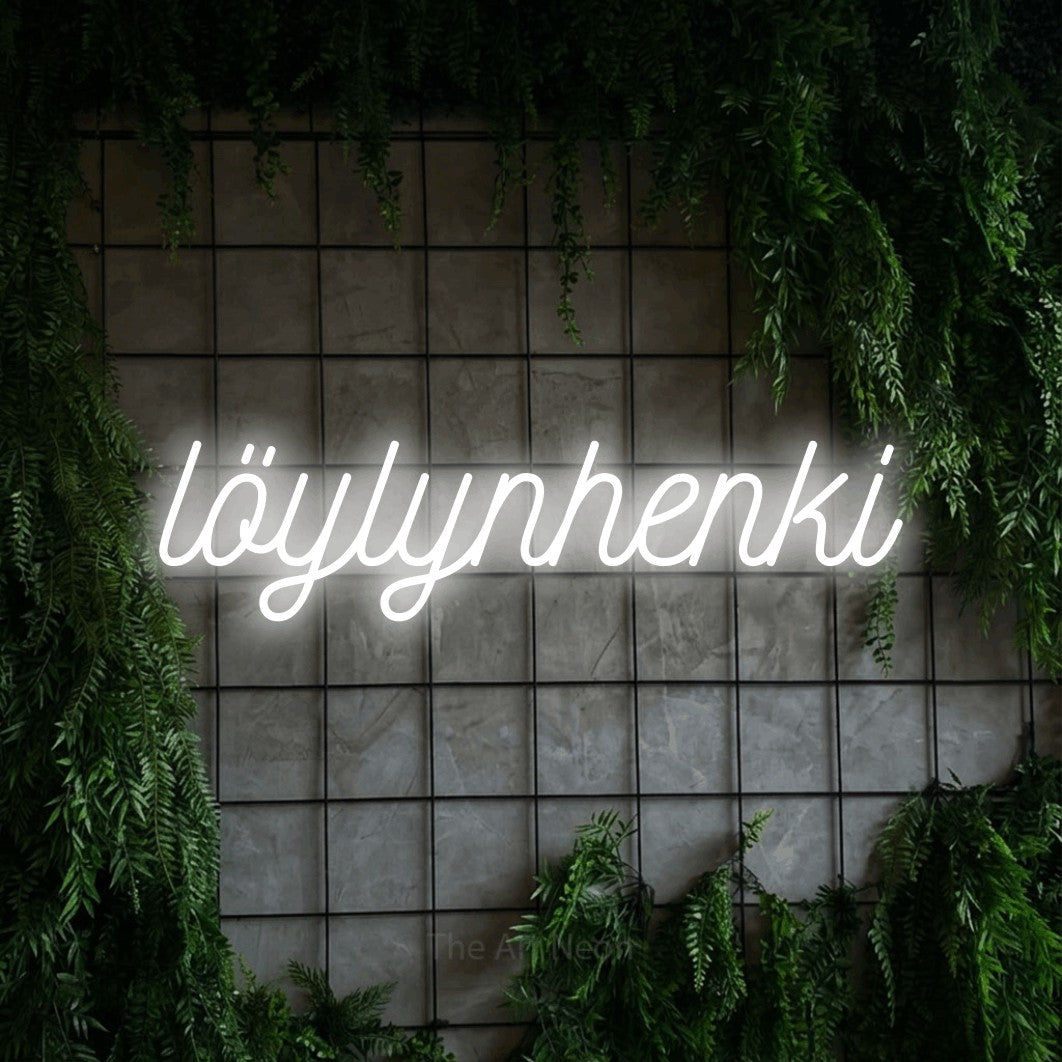 LED neon sign reading “löylynhenki”, arranged in a single line.