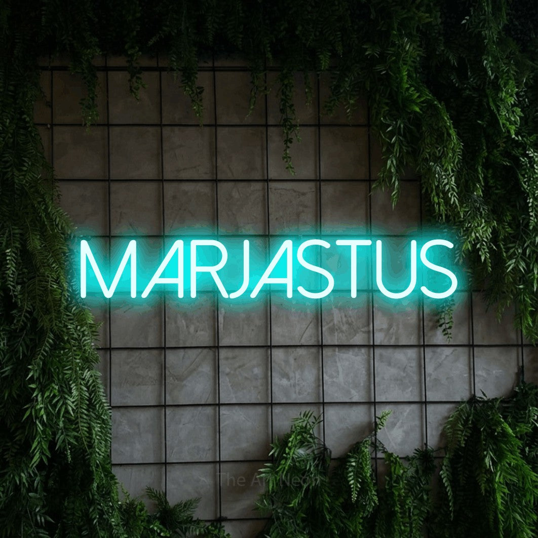 LED neon sign reading “MARJASTUS”, arranged in a single line.
