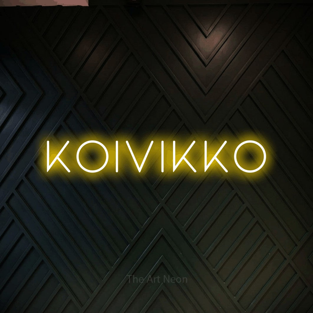 LED neon sign reading “KOIVIKKO”, arranged in a single line.