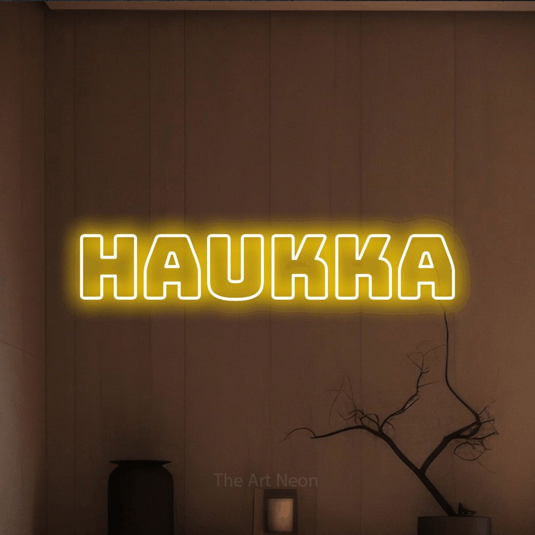 LED neon sign reading “Haukka”, arranged in a single line.