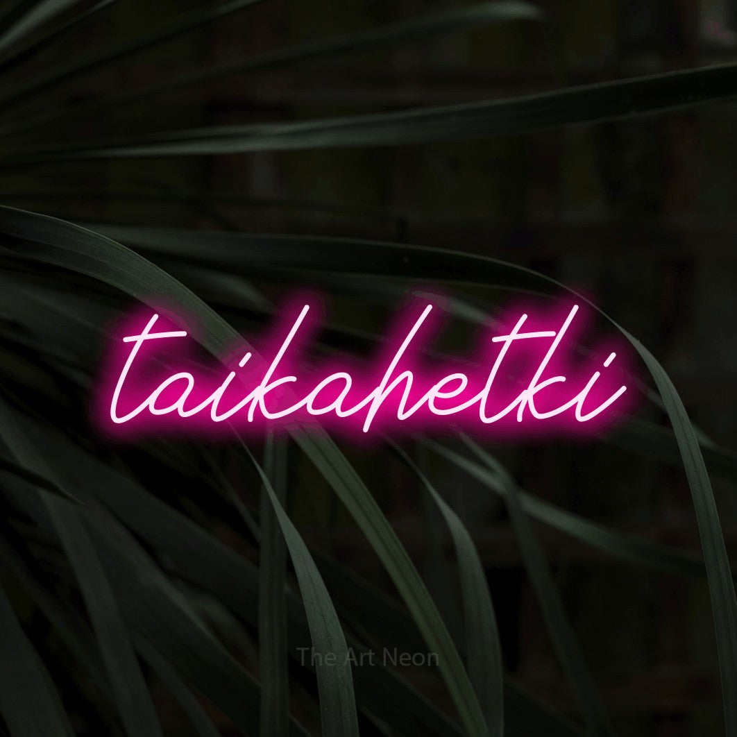 LED neon sign reading “taikahetki”, arranged in a single line.
