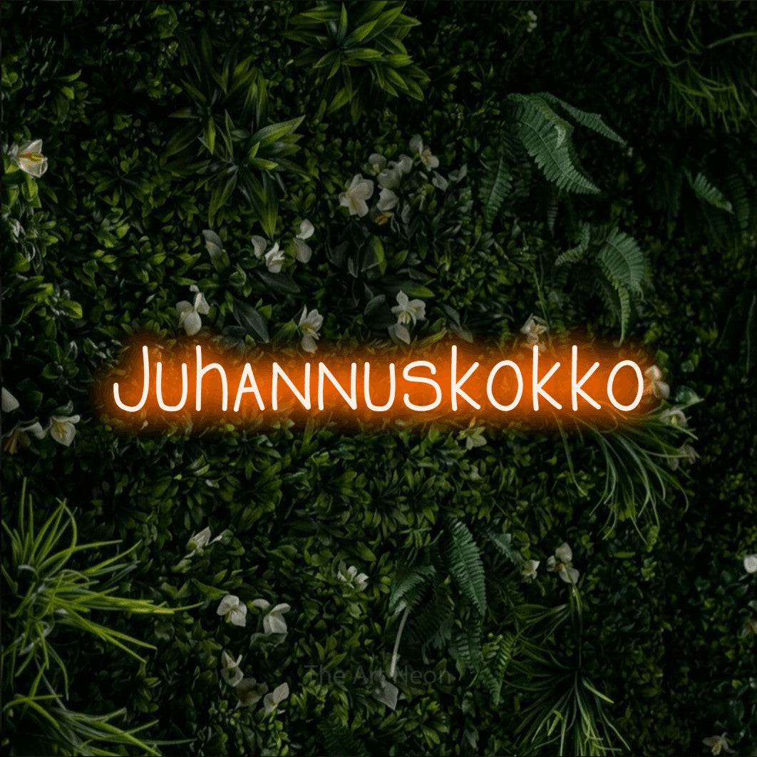 LED neon sign reading “Juhannuskokko”, arranged in a single line.