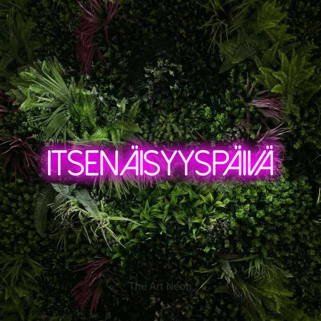 LED neon sign reading “ITSENÄISYYSPÄIVÄ”, arranged in a single line.