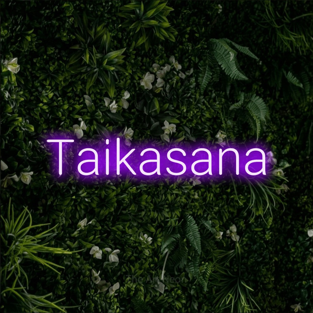 LED neon sign reading “Taikasana”, arranged in a single line.