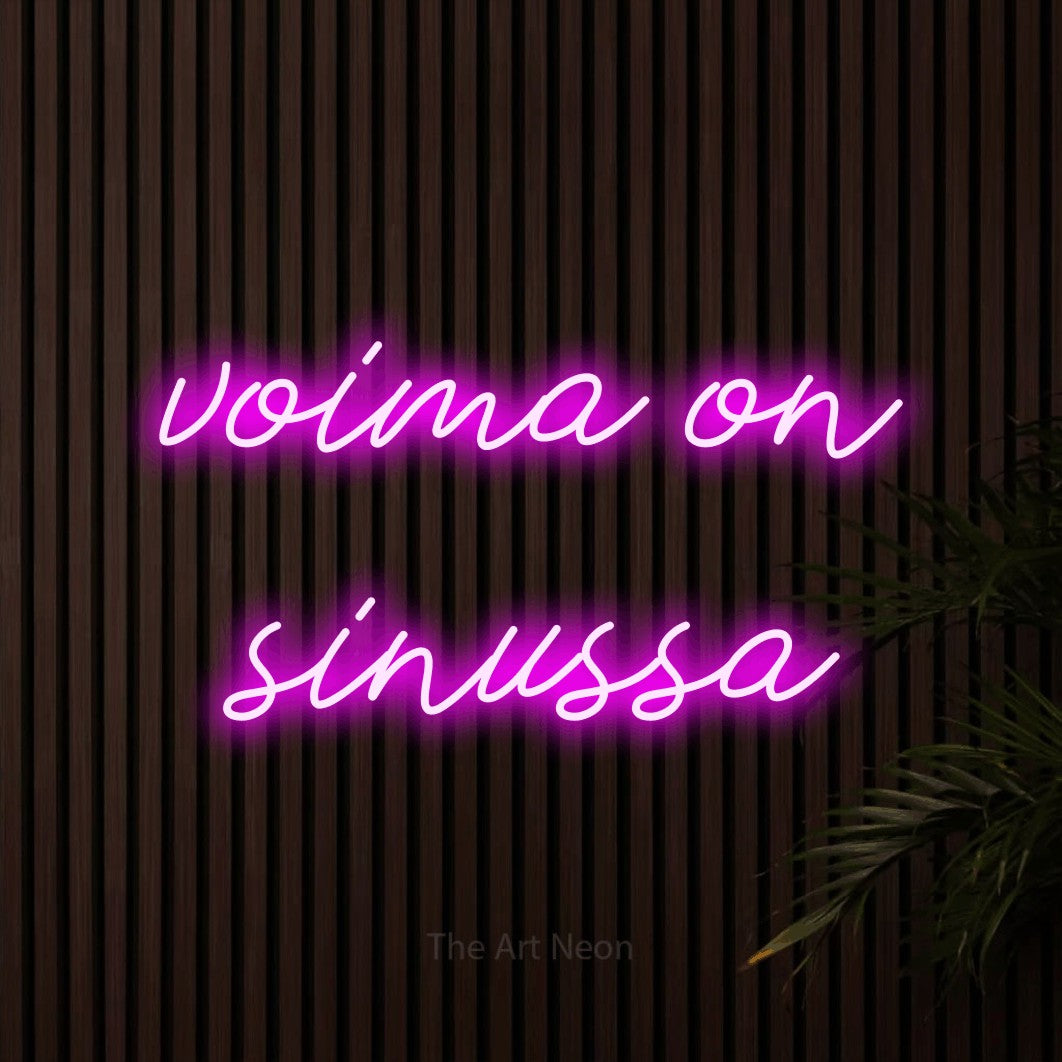 LED neon sign reading “voima on sinussa”, arranged in 2 lines.