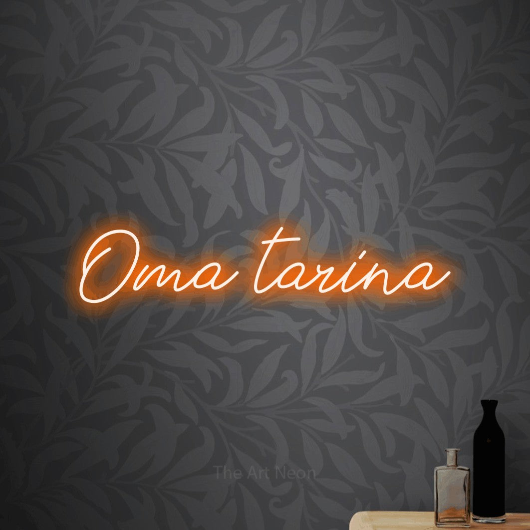 LED neon sign reading “Oma tarina”, arranged in a single line.