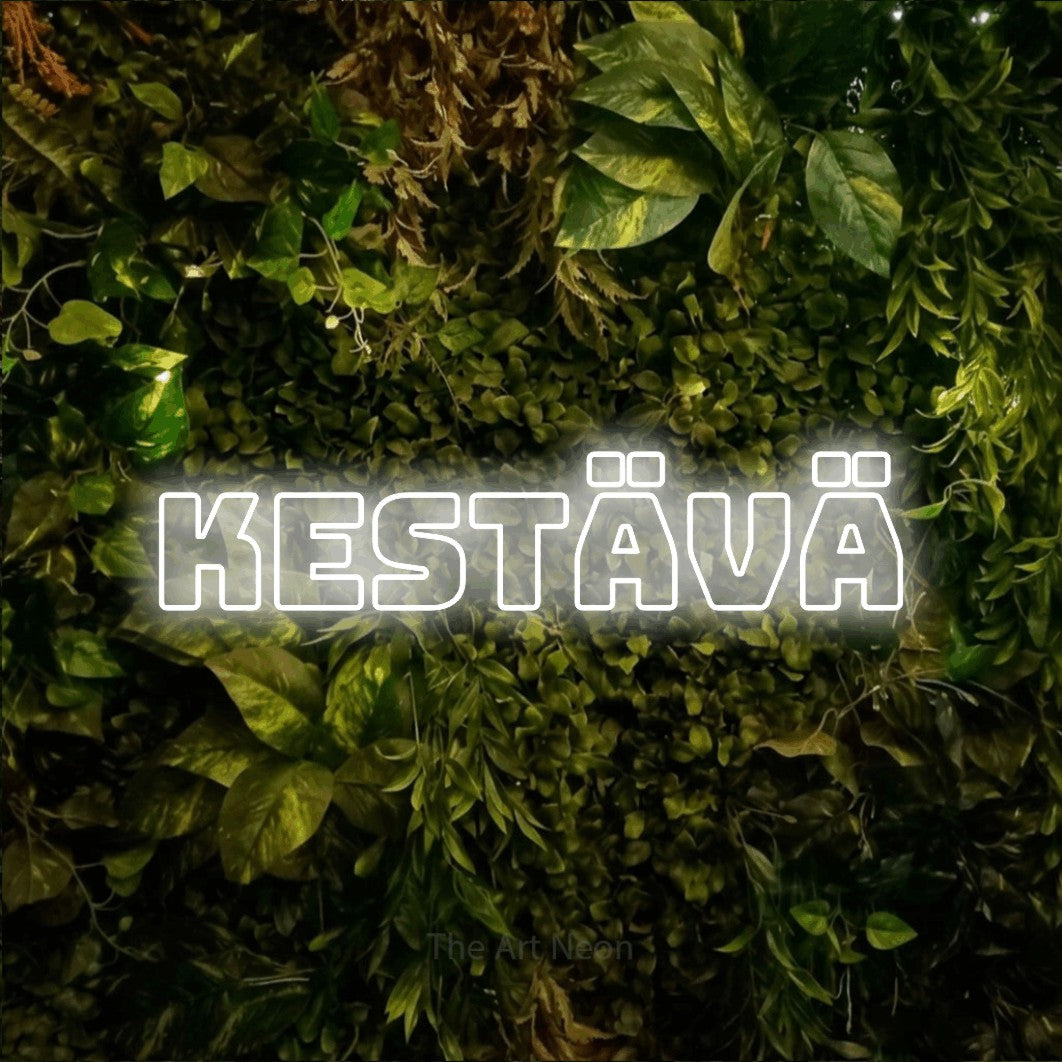LED neon sign reading “Kestävä”, arranged in a single line.