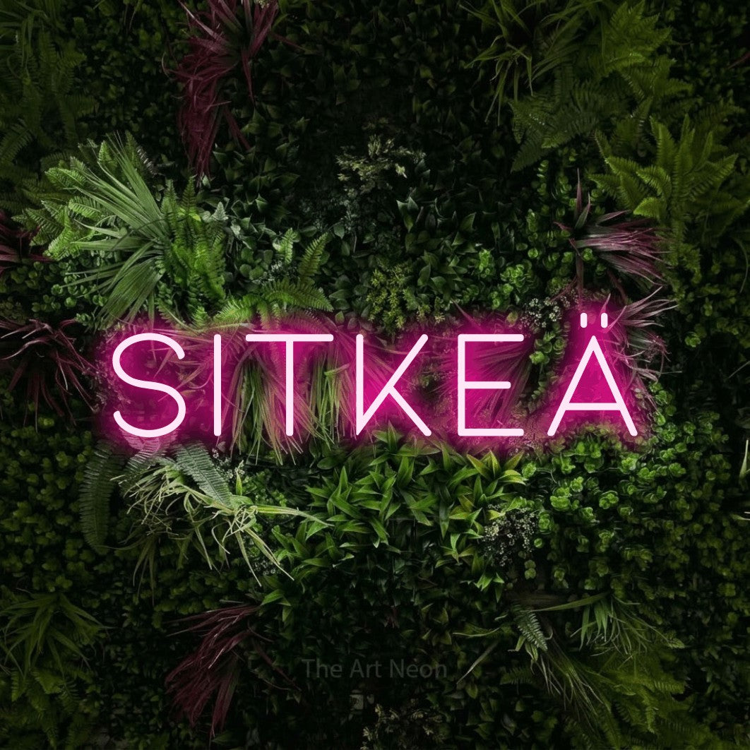 LED neon sign reading “Sitkeä”, arranged in a single line.