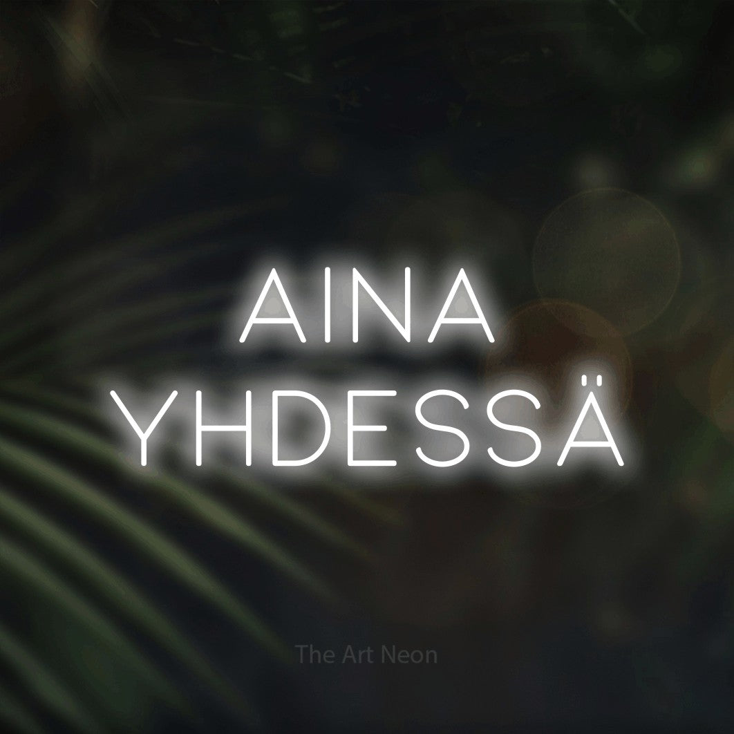 LED neon sign reading “AINA YHDESSÄ”, arranged in 2 lines.