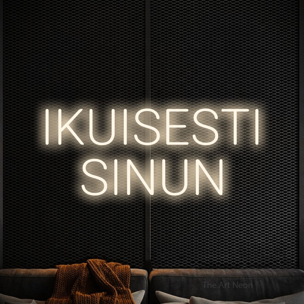 LED neon sign reading “IKUISESTI SINUN”, arranged in 2 lines.