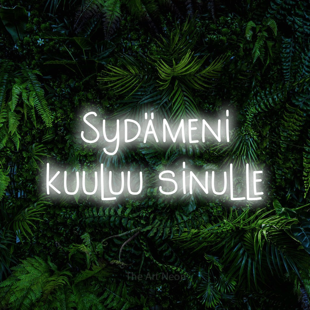LED neon sign reading “Sydämeni kuuluu sinulle”, arranged in 2 lines.
