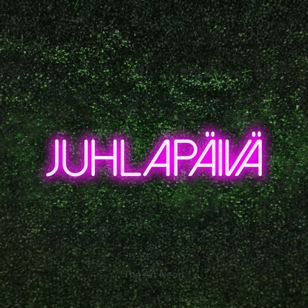 LED neon sign reading “Juhlapäivä”, arranged in a single line.