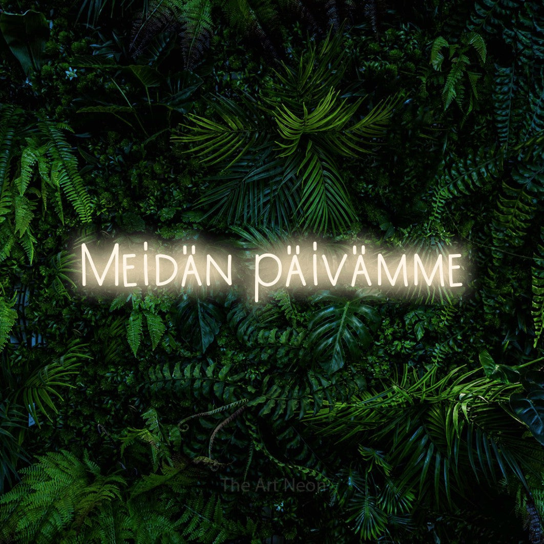 LED neon sign reading “Meidän päivämme”, arranged in a single line.