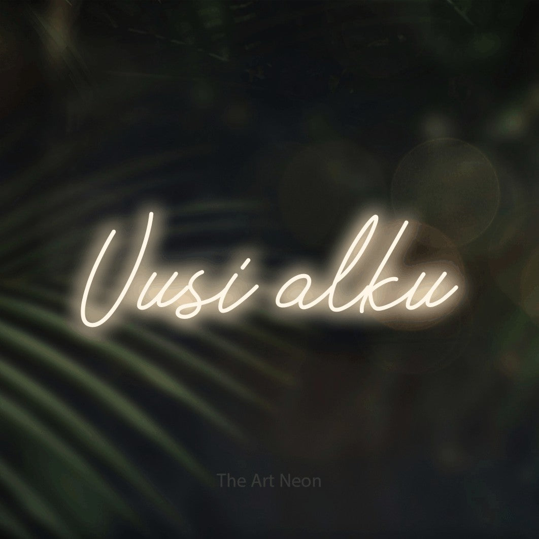 LED neon sign reading “Uusi alku”, arranged in a single line.