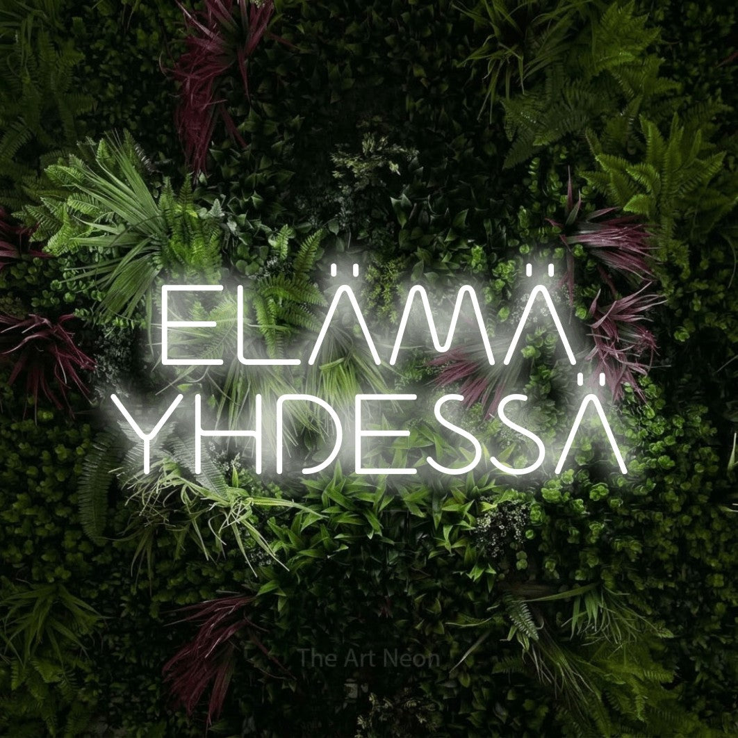 LED neon sign reading “ELÄMÄ YHDESSÄ”, arranged in 2 lines.