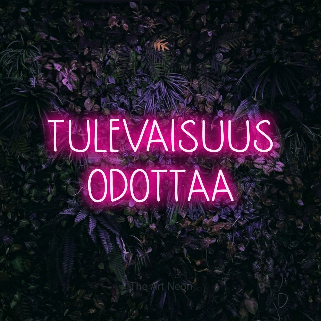 LED neon sign reading “TULEVAISUUS ODOTTAA”, arranged in 2 lines.