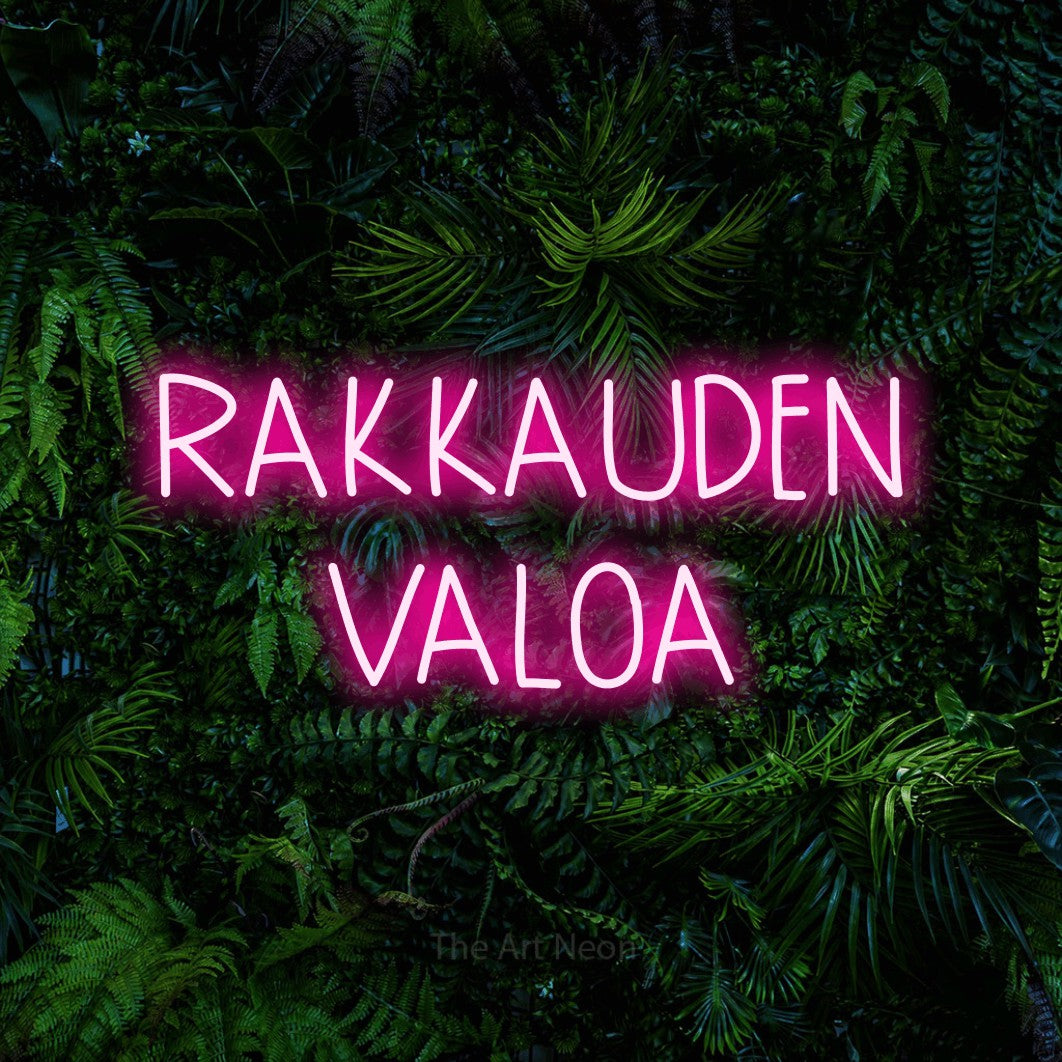 LED neon sign reading “RAKKAUDEN VALOA”, arranged in 2 lines.