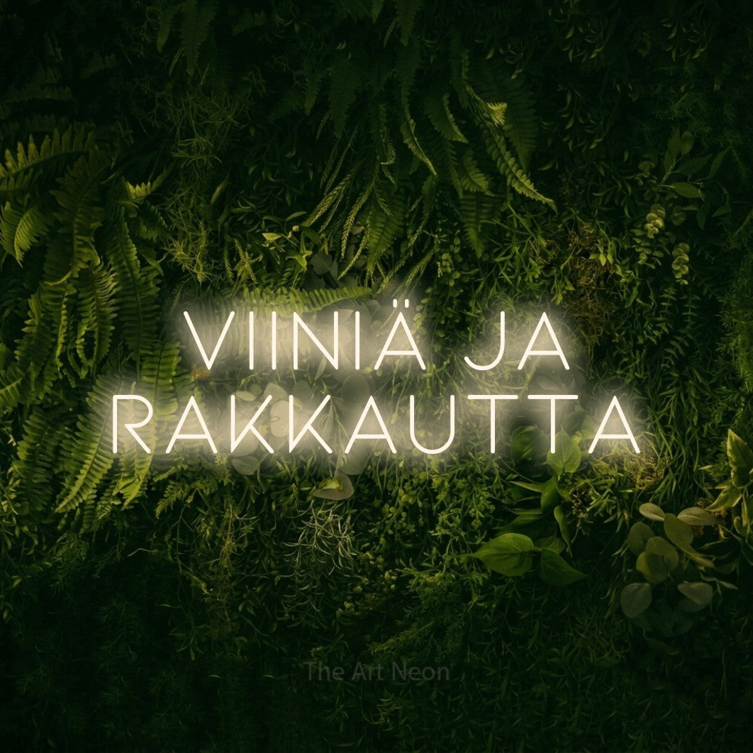LED neon sign reading “viiniä ja rakkautta”, arranged in 2 lines.