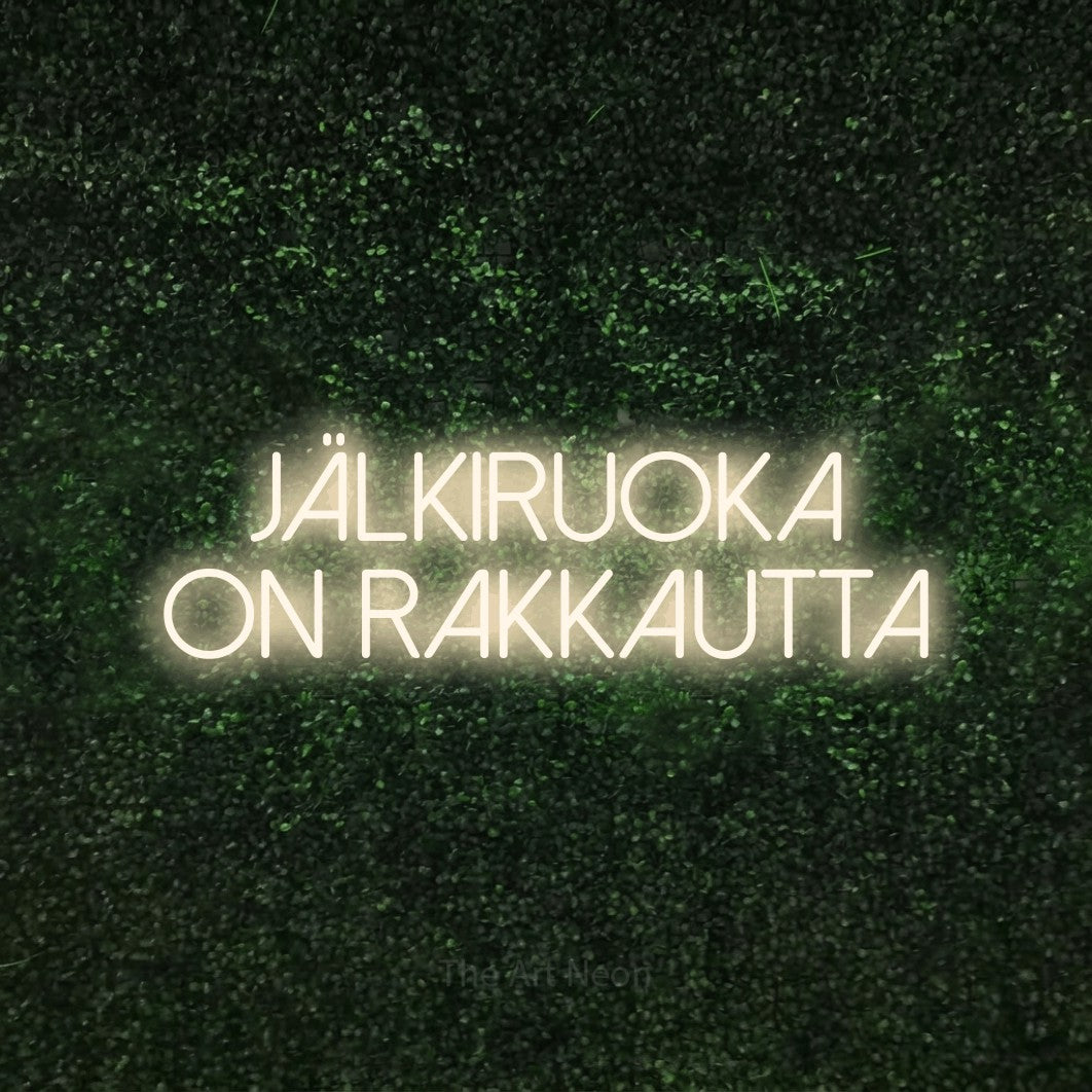 LED neon sign reading “Jälkiruoka on rakkautta”, arranged in 2 lines.