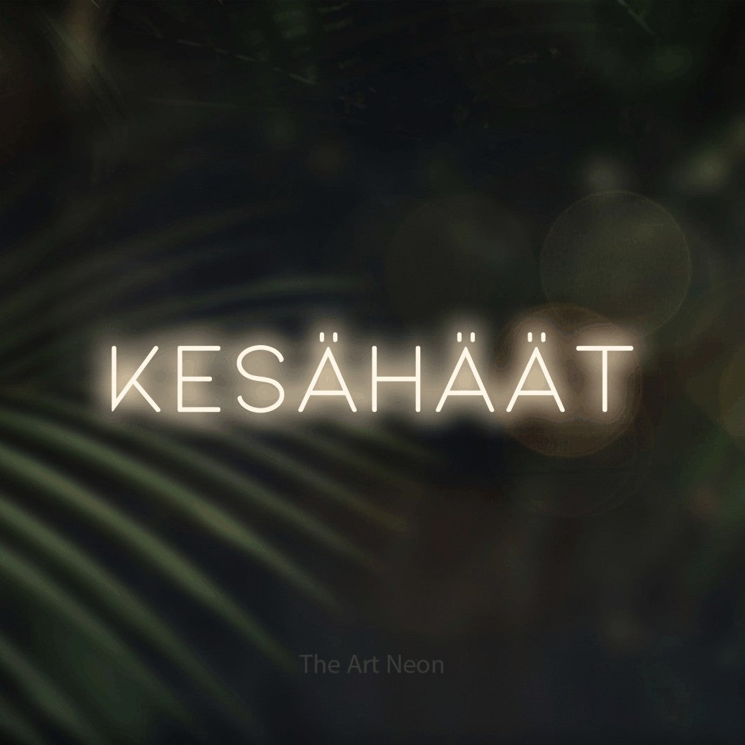 LED neon sign reading “KESÄHÄÄT”, arranged in a single line.