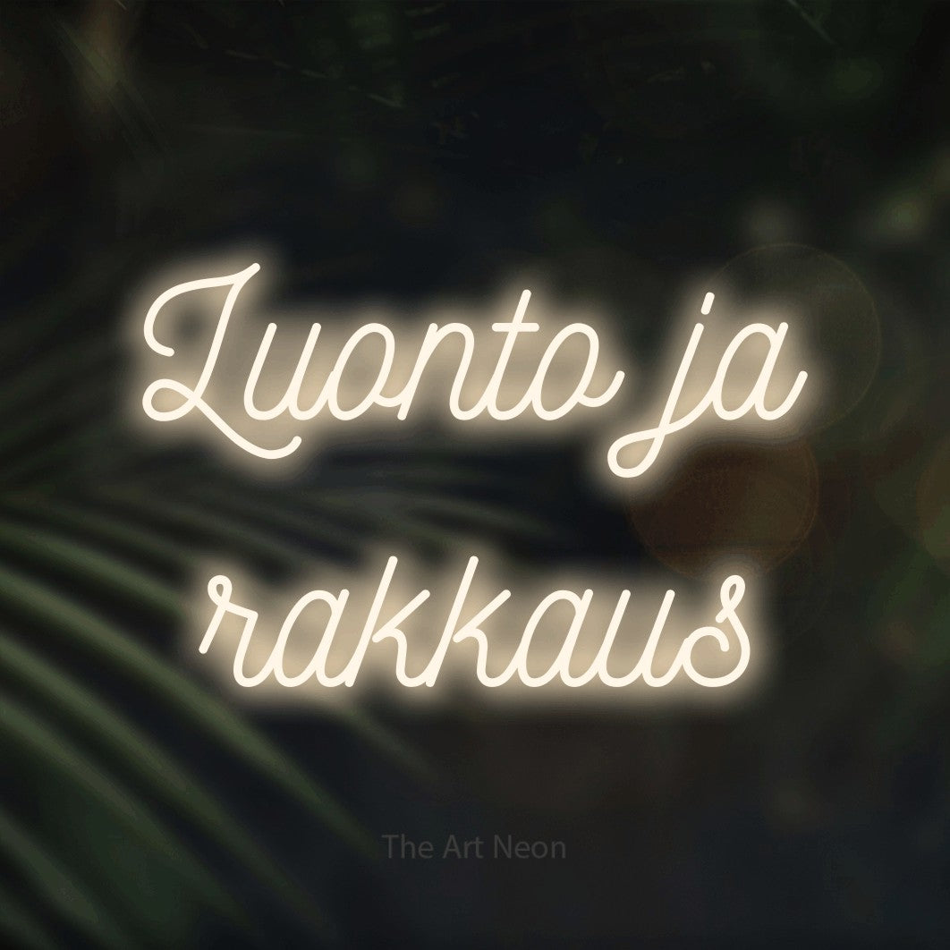 LED neon sign reading “Luonto ja rakkaus”, arranged in 2 lines.
