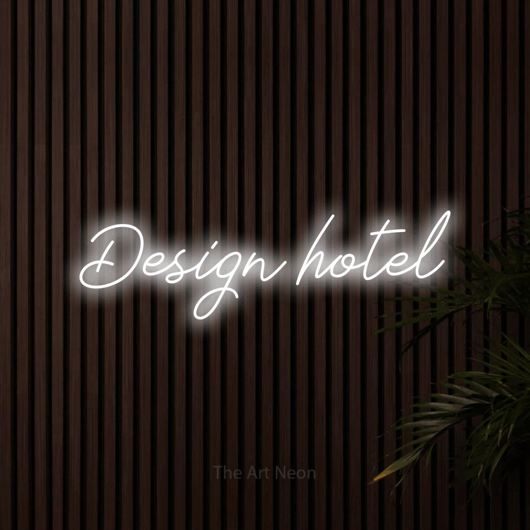 LED neon sign reading “Design hotel”, arranged in a single line.