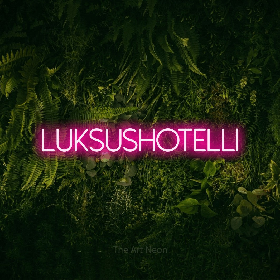 LED neon sign reading “LUKSUSHOTELLI”, arranged in a single line.