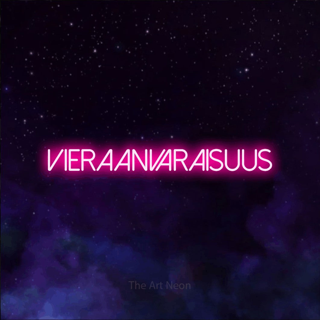 LED neon sign reading “Vieraanvaraisuus”, arranged in a single line.