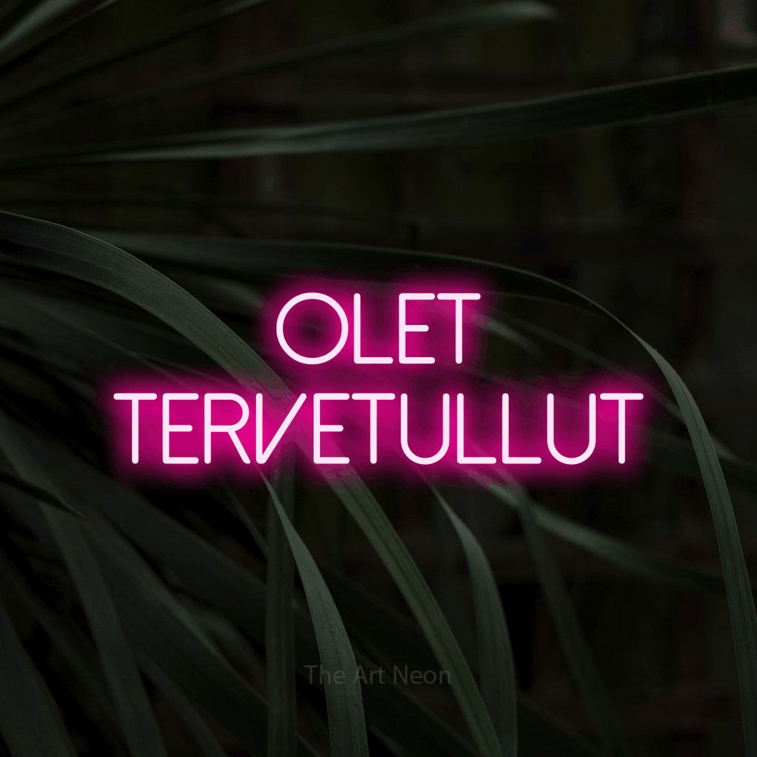 LED neon sign reading “olet TERVETULLUT”, arranged in 2 lines.
