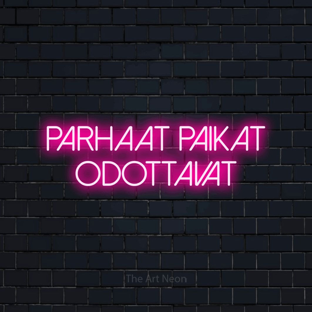 LED neon sign reading “parhaat paikat odottavat”, arranged in 2 lines.