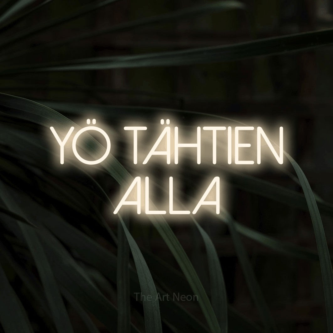 LED neon sign reading “YÖ TÄHTIEN ALLA”, arranged in 2 lines.