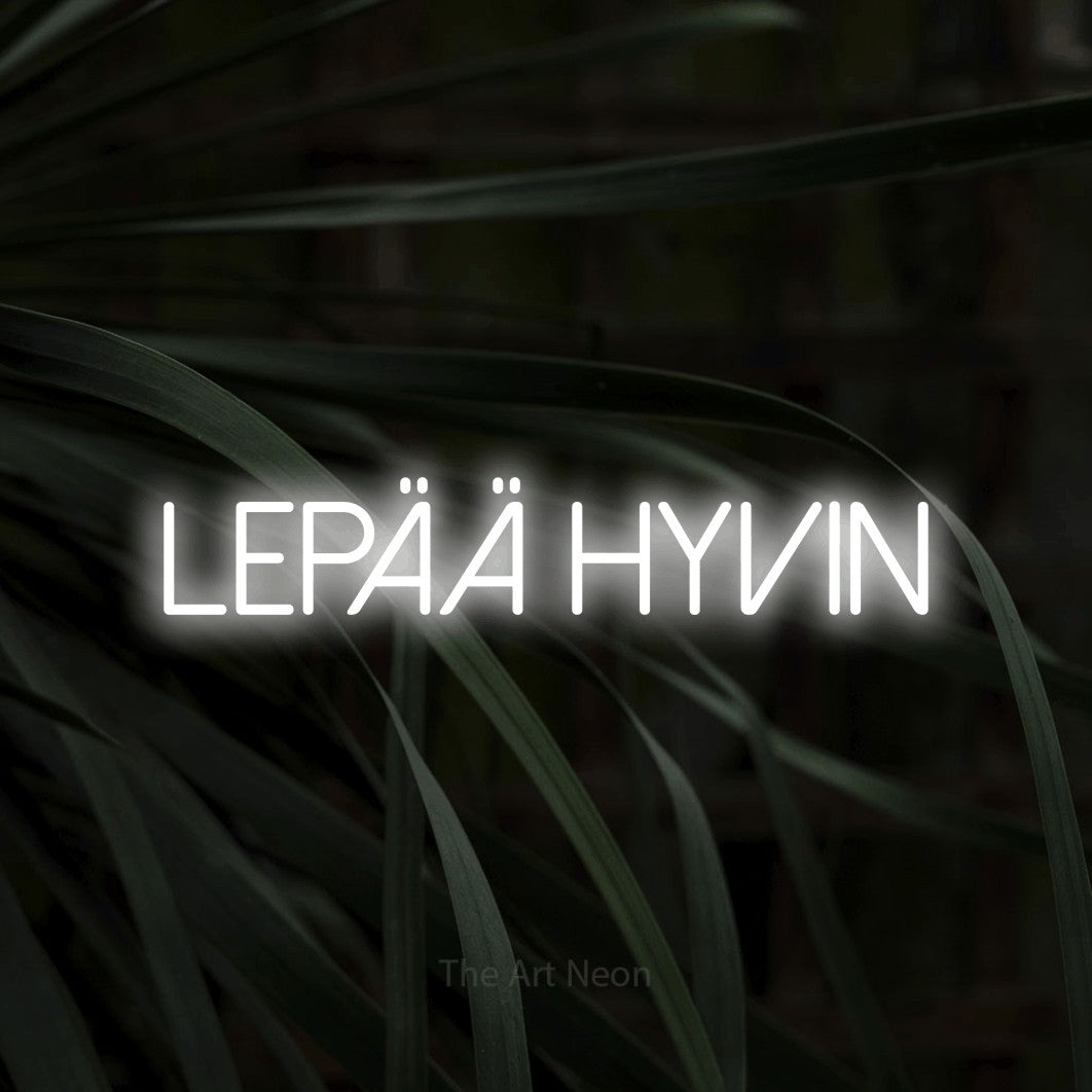 LED neon sign reading “Lepää hyvin”, arranged in a single line.