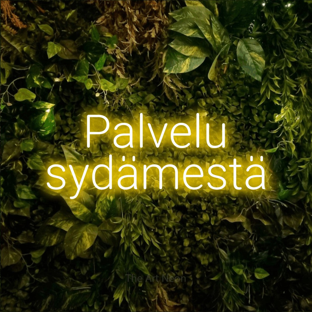 LED neon sign reading “Palvelu sydämestä”, arranged in 2 lines.