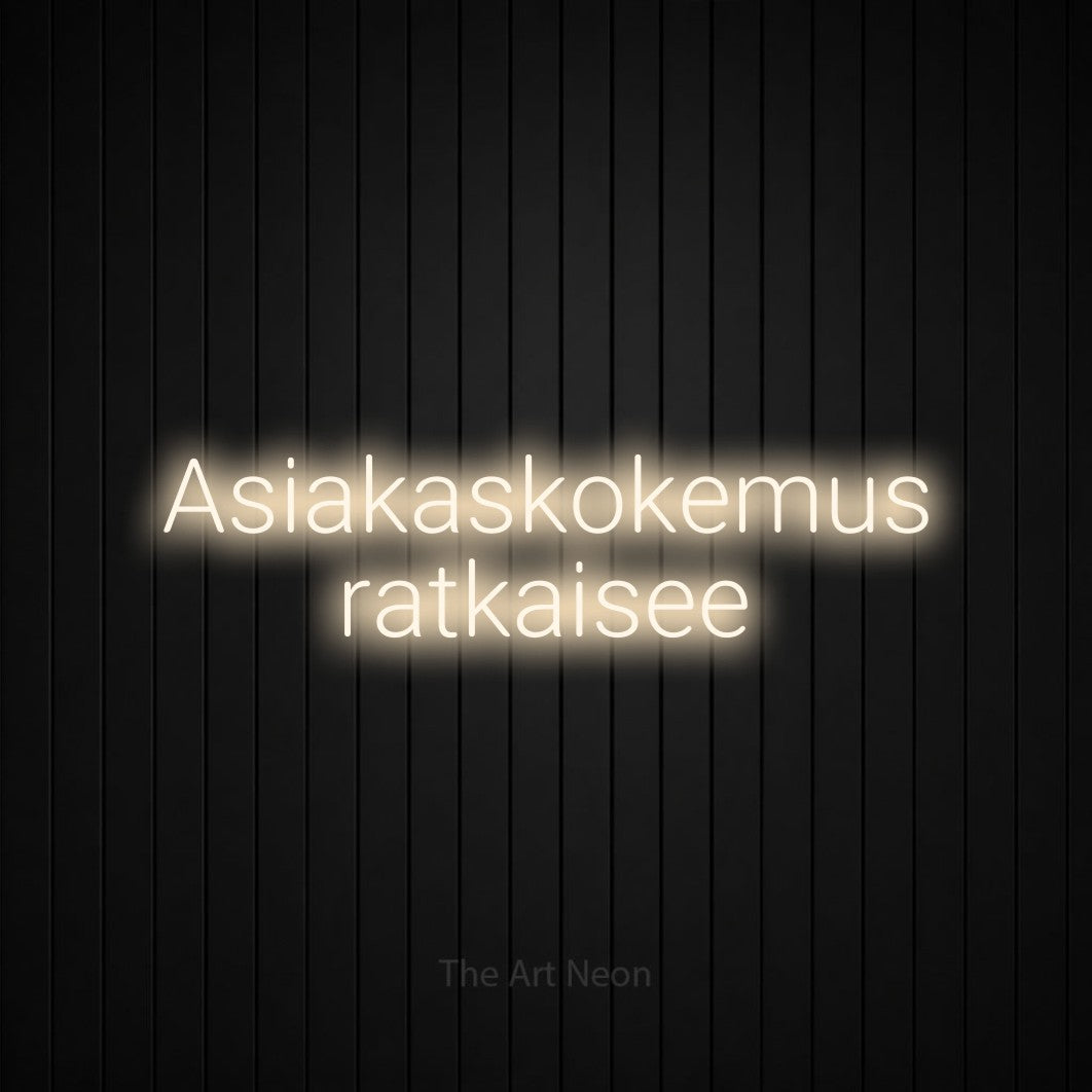 LED neon sign reading “Asiakaskokemus ratkaisee”, arranged in 2 lines.