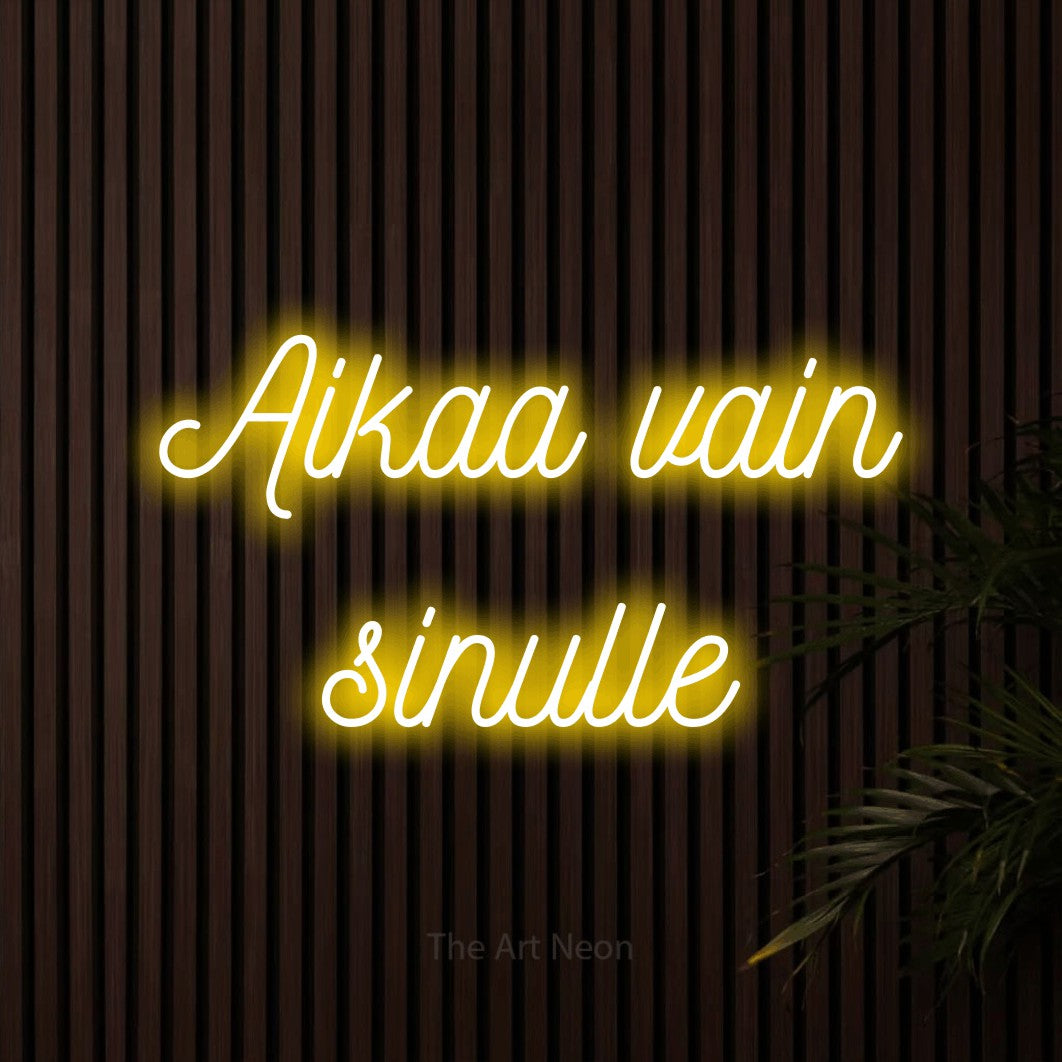 LED neon sign reading “Aikaa vain sinulle”, arranged in 2 lines.