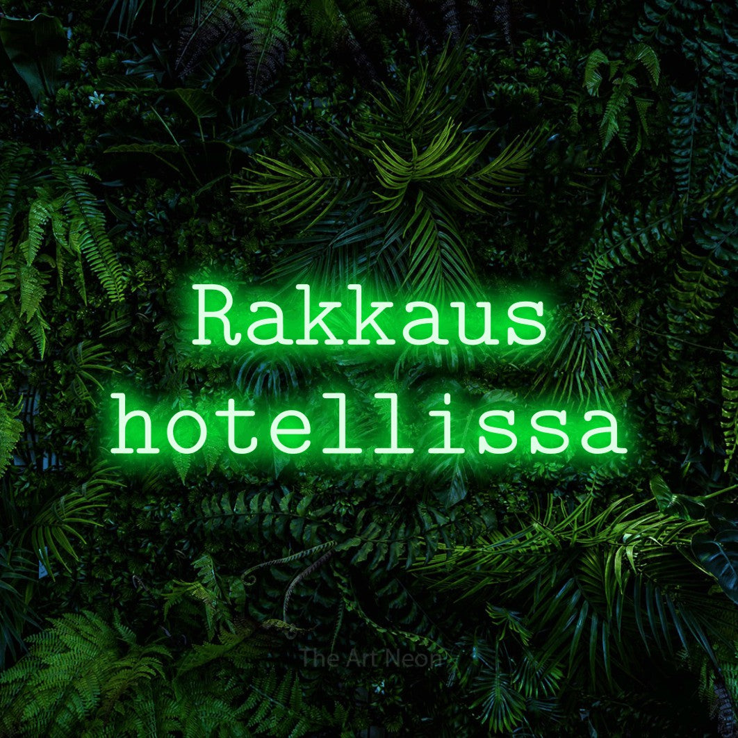 LED neon sign reading “Rakkaus hotellissa”, arranged in 2 lines.