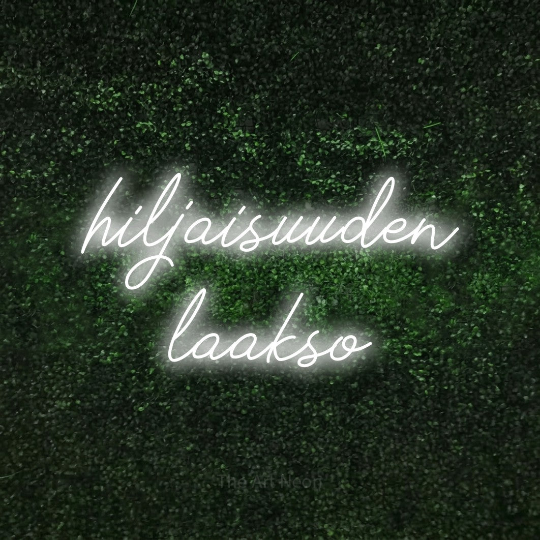 LED neon sign reading “hiljaisuuden laakso”, arranged in 2 lines.