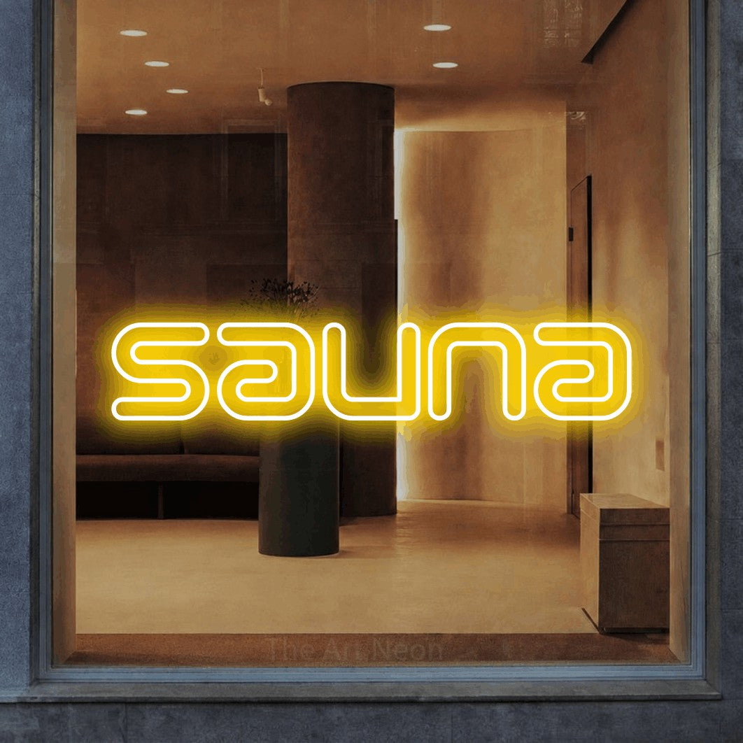 LED neon sign reading “Sauna”, arranged in a single line.