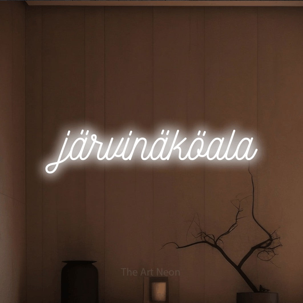 LED neon sign reading “järvinäköala”, arranged in a single line.