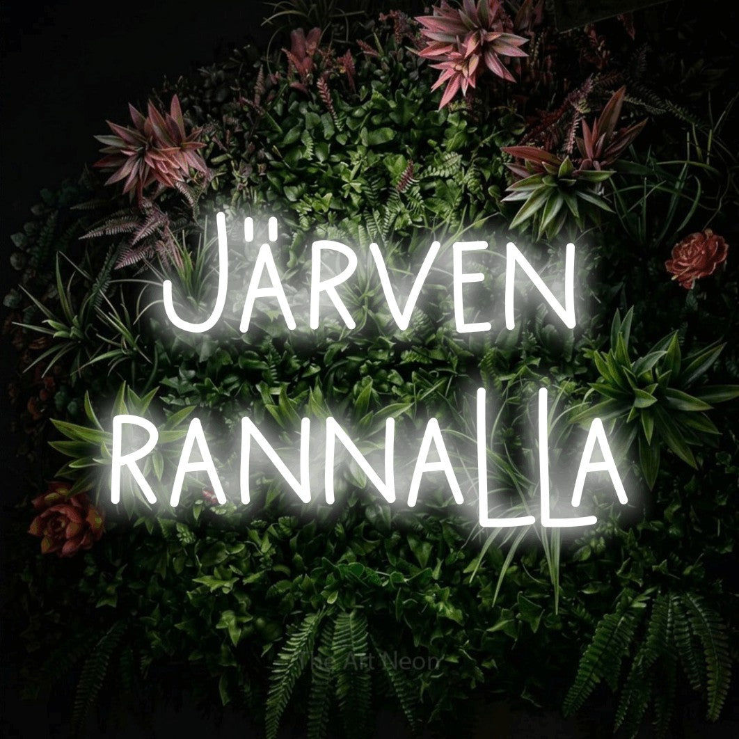 LED neon sign reading “Järven rannalla”, arranged in 2 lines.