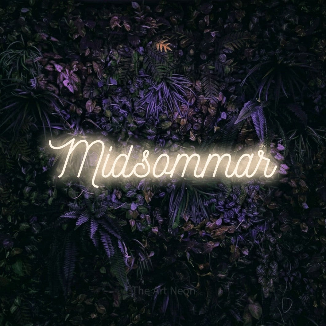 LED neon sign reading “Midsommar”, arranged in a single line.